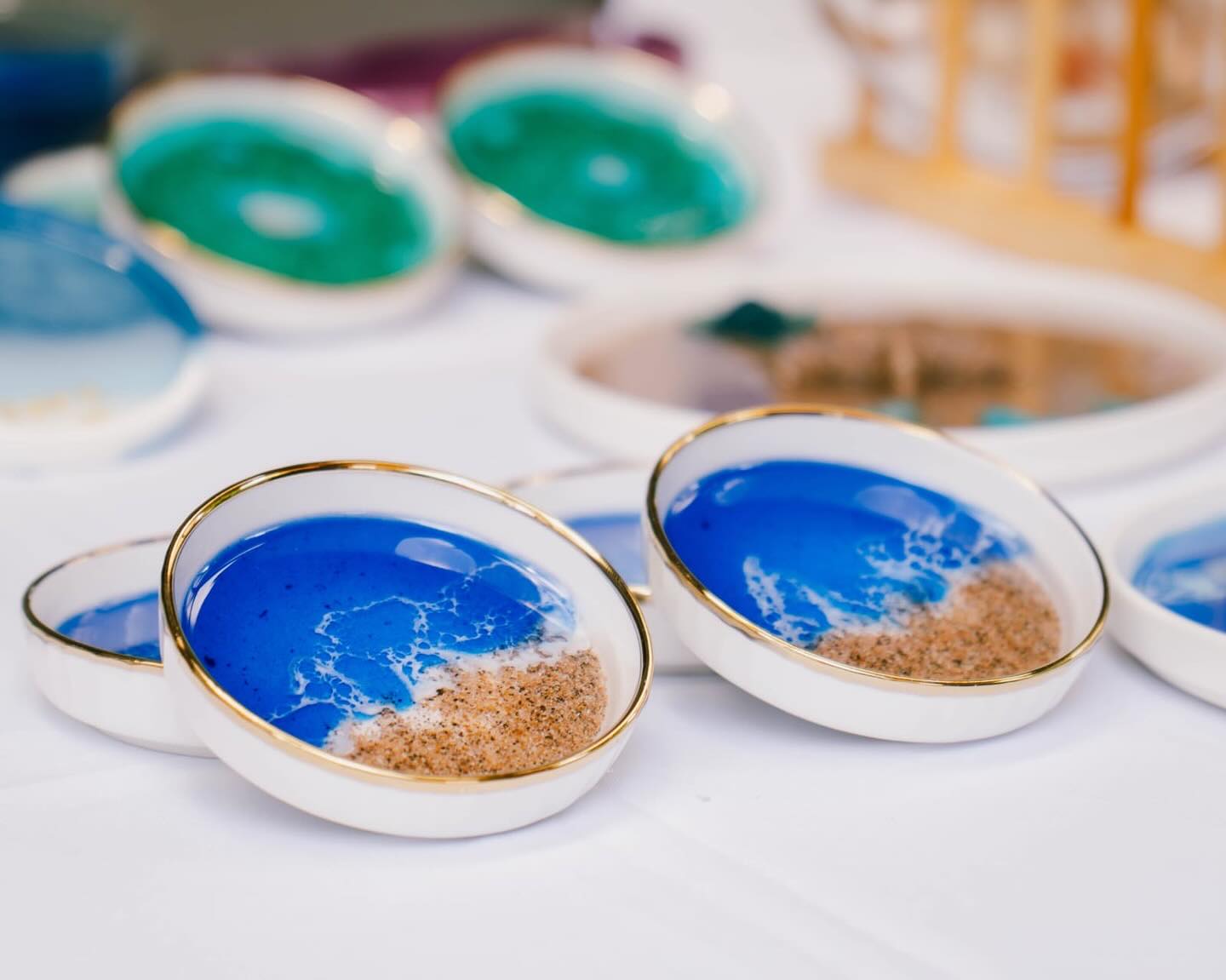 Blue and white resin waves frozen in motion sculpture